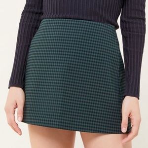 Green and black mini skirt